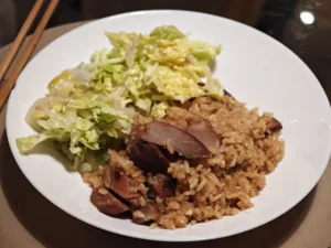 Porc in sos dulce cu orez