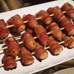 Cremwurst in bacon