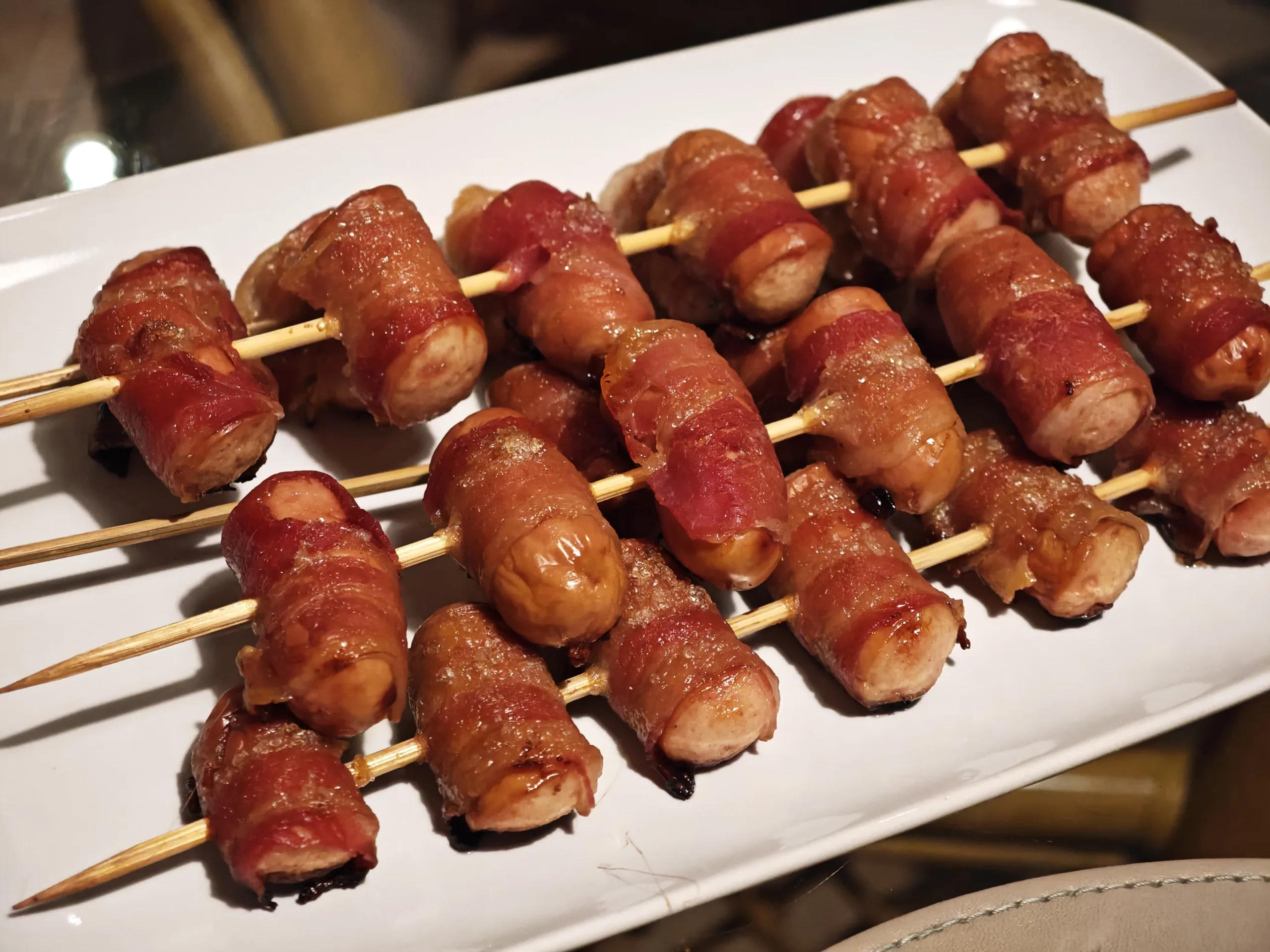 Cremwurst in bacon