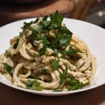 Spaghetti con ricotta e pesto di pistacchi