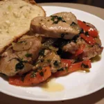 Muschiulet de porc cu patrunjel si unt la tigaie