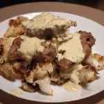 Muschiulet de porc cu conopida si sos curry